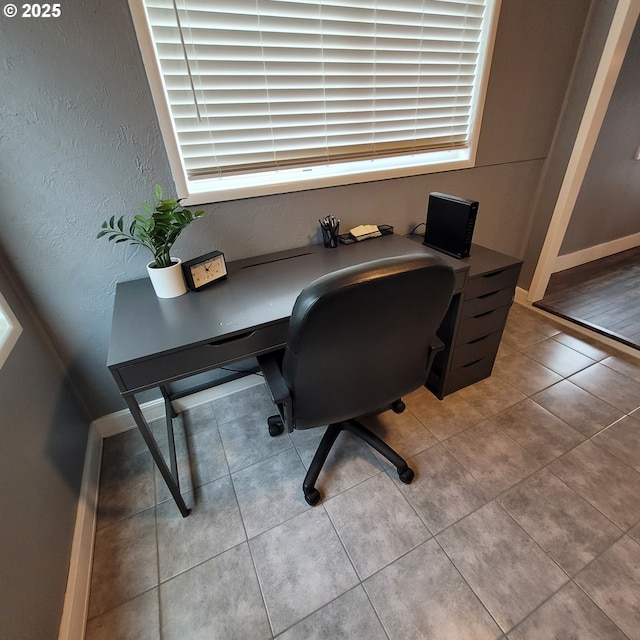 1875 W 18th Ave, Eugene, OR 97402 - office space with a textured wall, tile patterned floors, and baseboards