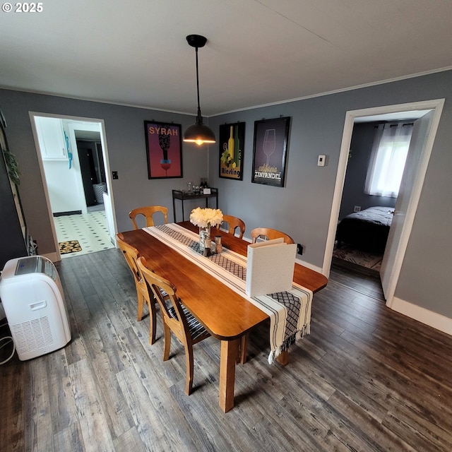 1875 W 18th Ave, Eugene, OR 97402 - dining area with baseboards, wood finished floors, and crown molding