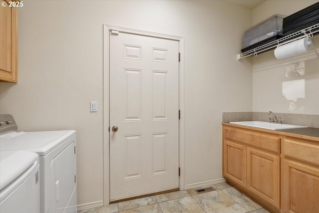 853 NE Cobblestone Ct, Prineville, OR 97754 - laundry area featuring cabinet space, washing machine and dryer, and baseboards