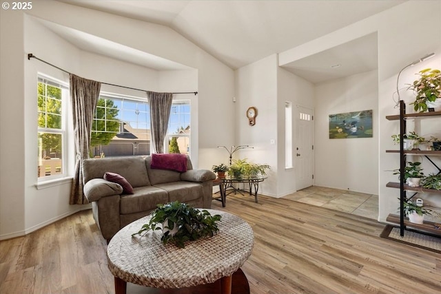 853 NE Cobblestone Ct, Prineville, OR 97754 - living area featuring light wood-style flooring, lofted ceiling, and baseboards