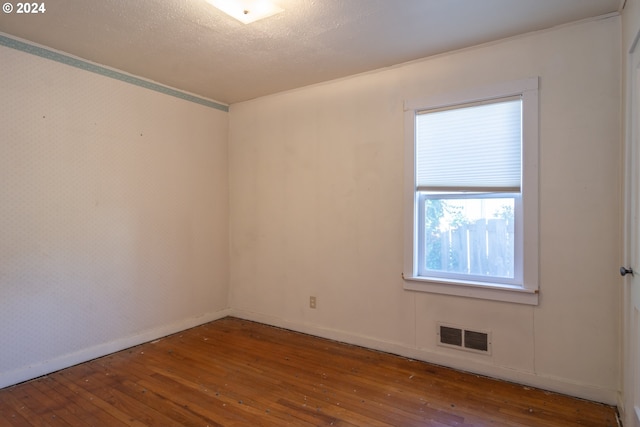 1772 SE Hamilton St, Roseburg, OR 97470 - spare room featuring hardwood / wood-style floors, baseboards, and crown molding