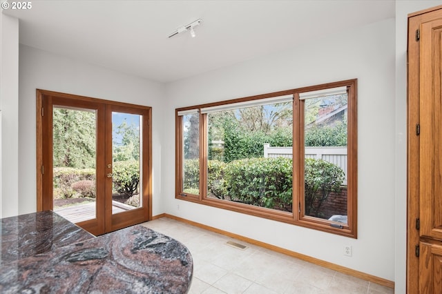 entryway featuring french doors, visible vents, and baseboards