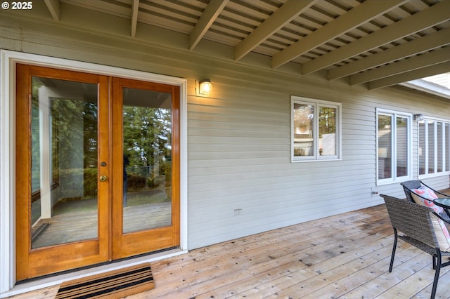 deck with french doors and visible vents