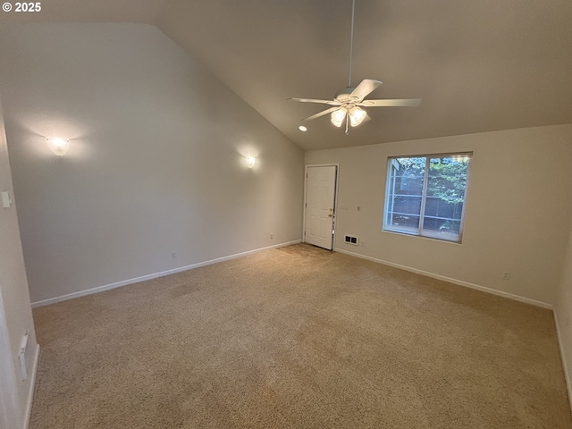 5336 Buckskin Bob, Florence, OR 97439 - empty room featuring vaulted ceiling, ceiling fan, and light carpet