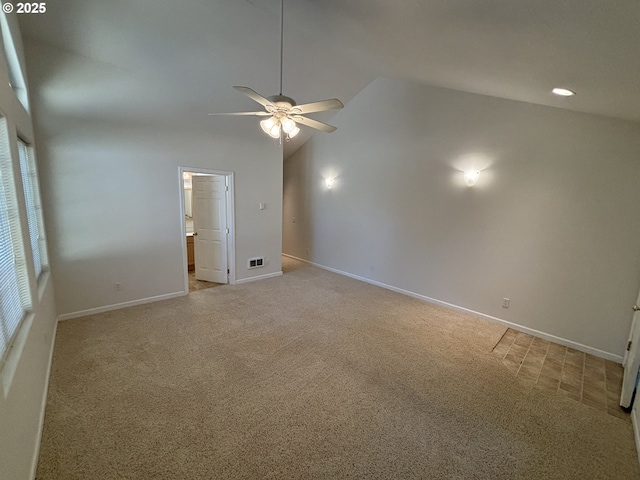 5336 Buckskin Bob, Florence, OR 97439 - unfurnished room with light carpet, baseboards, visible vents, and ceiling fan