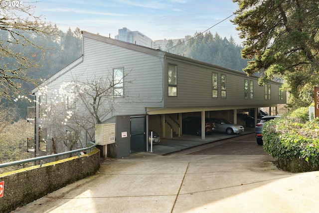 view of side of home featuring a mountain view