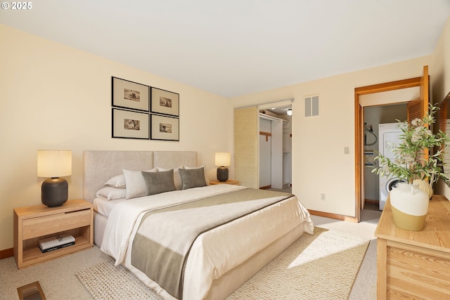 bedroom with carpet floors and a closet