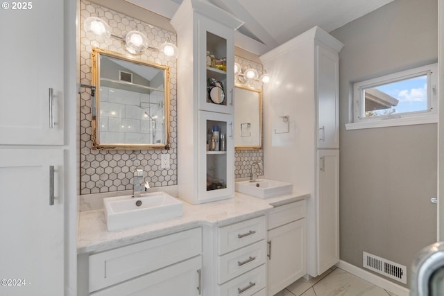 465 SW Edgewater, Depoe Bay, OR 97341 - bathroom featuring tasteful backsplash, double vanity, and a shower