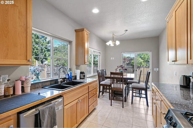 3647 Lodenquai Ln, Eugene, OR 97404 - kitchen featuring a sink, appliances with stainless steel finishes, healthy amount of natural light, a chandelier, and recessed lighting