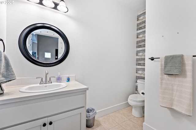 3647 Lodenquai Ln, Eugene, OR 97404 - bathroom with tile patterned floors, toilet, vanity, and baseboards