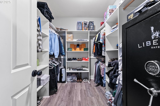 3647 Lodenquai Ln, Eugene, OR 97404 - walk in closet featuring wood finished floors