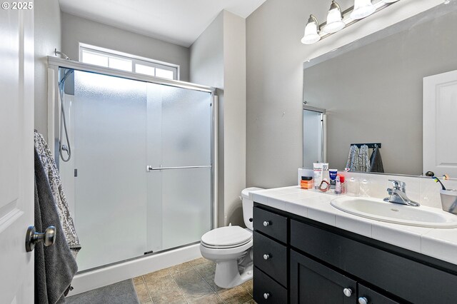 3647 Lodenquai Ln, Eugene, OR 97404 - full bath with a stall shower, toilet, and vanity