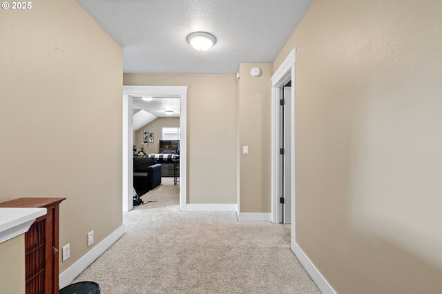 3647 Lodenquai Ln, Eugene, OR 97404 - hall featuring carpet flooring, a textured ceiling, and baseboards