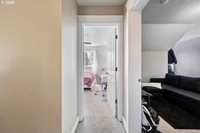 3647 Lodenquai Ln, Eugene, OR 97404 - corridor featuring light carpet and a textured ceiling