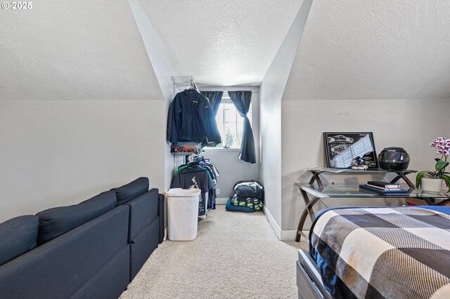 3647 Lodenquai Ln, Eugene, OR 97404 - bedroom featuring a textured ceiling, carpet flooring, and baseboards