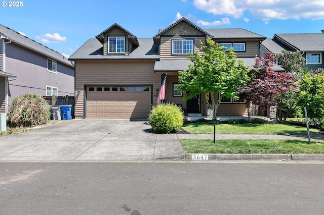 3647 Lodenquai Ln, Eugene, OR 97404 - craftsman-style home featuring driveway, roof with shingles, a garage, and a front lawn