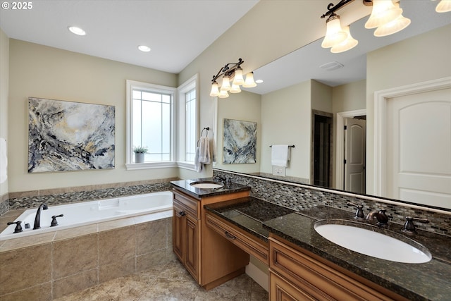 full bathroom featuring a bath and double vanity
