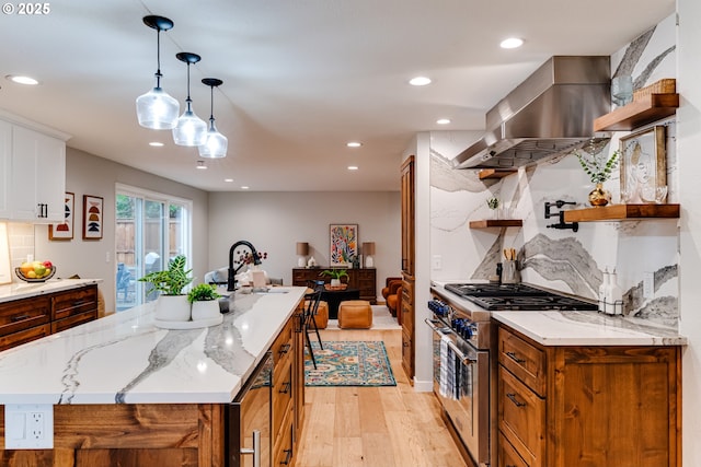 2915 Chuckanut St, Eugene, OR 97408 - kitchen with open shelves, stainless steel stove, light wood-style floors, island range hood, and brown cabinetry