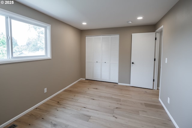 2915 Chuckanut St, Eugene, OR 97408 - unfurnished bedroom with light wood finished floors, recessed lighting, and a closet