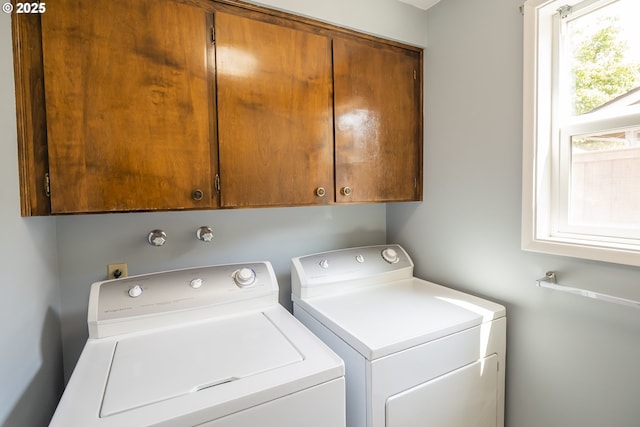2915 Chuckanut St, Eugene, OR 97408 - washroom featuring cabinet space and separate washer and dryer