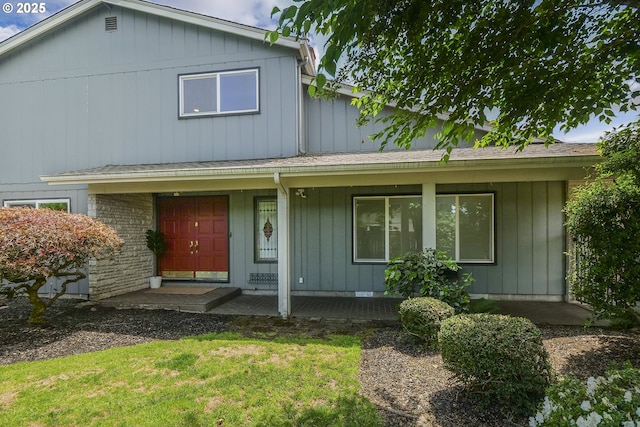 2915 Chuckanut St, Eugene, OR 97408 - view of front of property featuring a porch, a front yard, and roof with shingles
