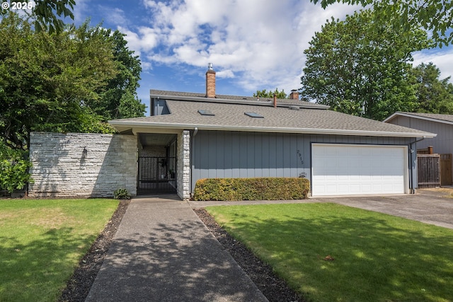 2915 Chuckanut St, Eugene, OR 97408 - view of front facade with a chimney, an attached garage, driveway, a shingled roof, and a gate