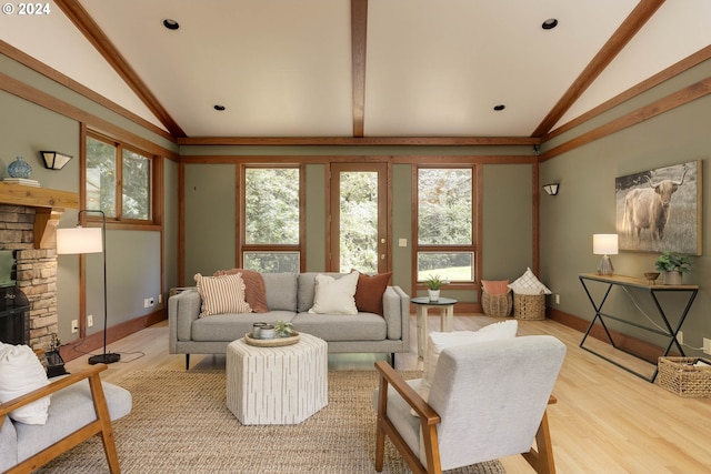 living room featuring light wood-style floors, lofted ceiling, and recessed lighting