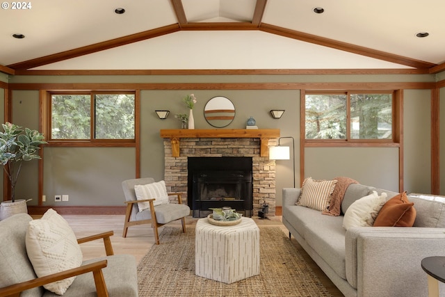 living area with light wood-style flooring, a fireplace, vaulted ceiling, and recessed lighting