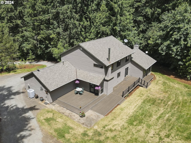 bird's eye view featuring a forest view