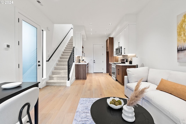 living room with light wood-type flooring