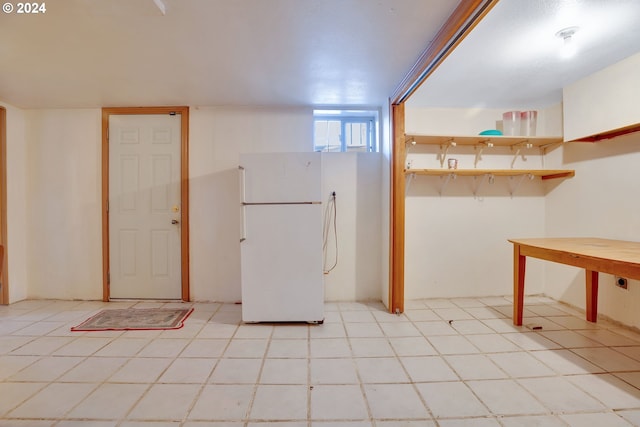 entrance foyer with light tile floors