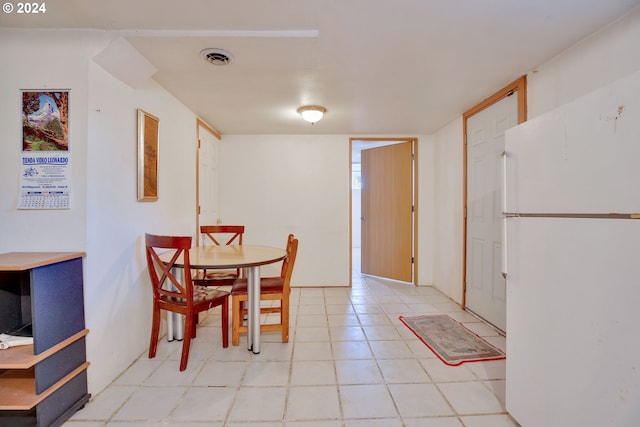 view of tiled dining area