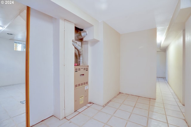 corridor with light tile flooring