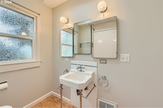 bathroom featuring tile floors