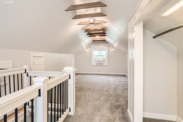 bonus room featuring carpet and vaulted ceiling