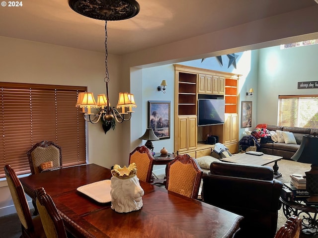 dining room with a notable chandelier