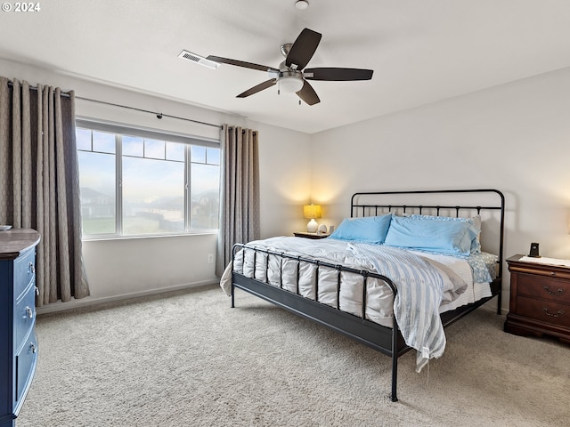 bedroom featuring ceiling fan and carpet floors