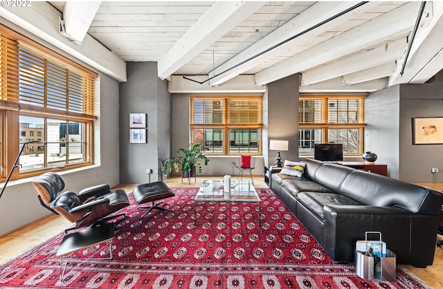 living room featuring beamed ceiling and wooden ceiling