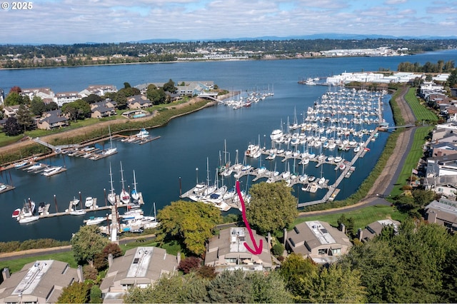 drone / aerial view with a water view