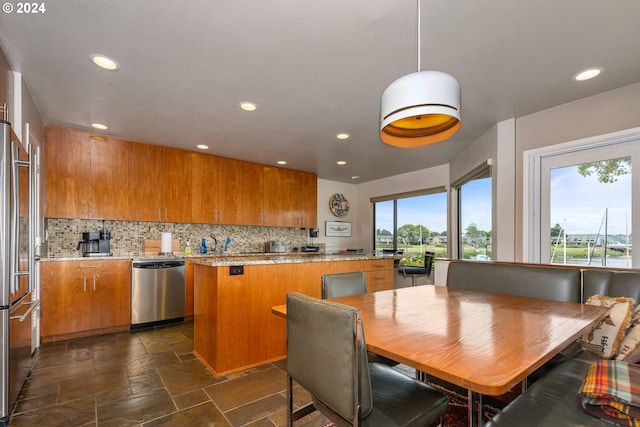 dining room featuring plenty of natural light