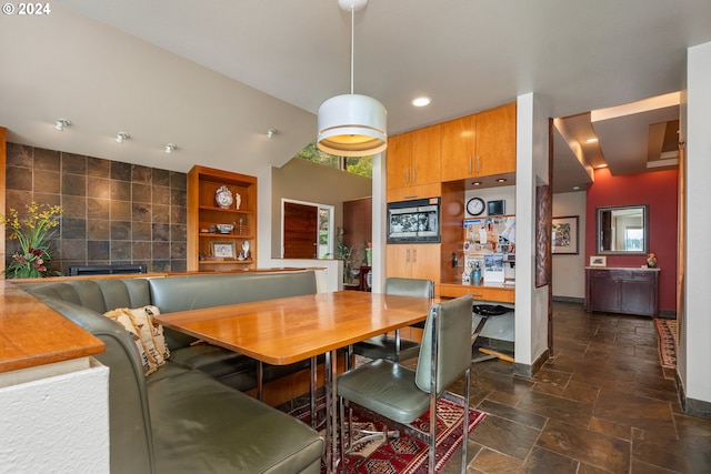 dining area with tile walls