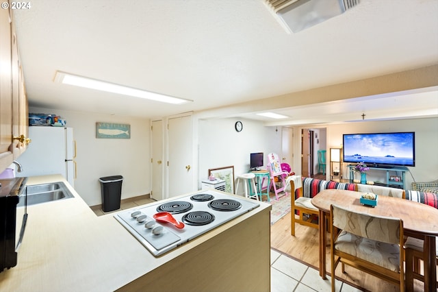 kitchen featuring light hardwood / wood-style floors and sink