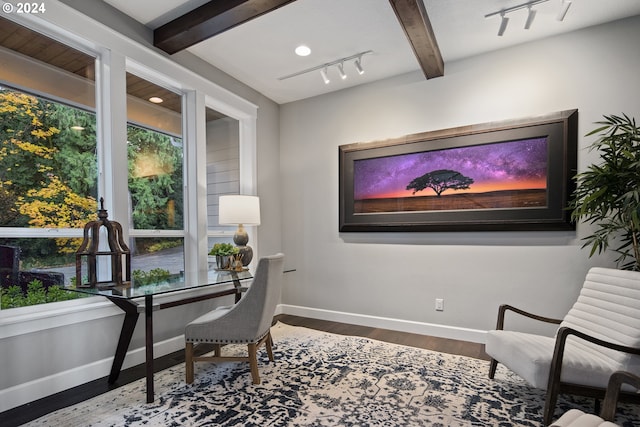 office area with rail lighting, beamed ceiling, and hardwood / wood-style flooring