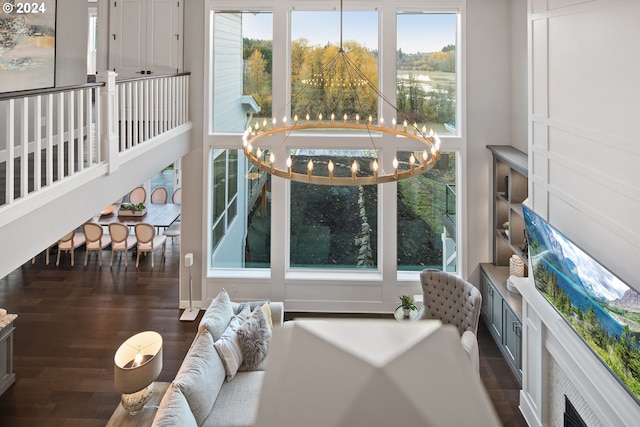 sunroom with a notable chandelier