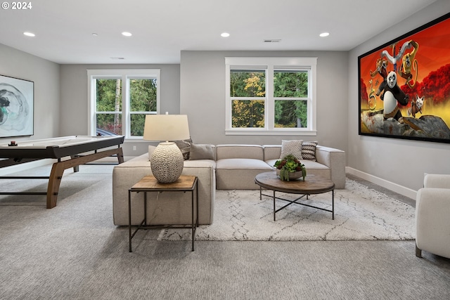 living room with light colored carpet