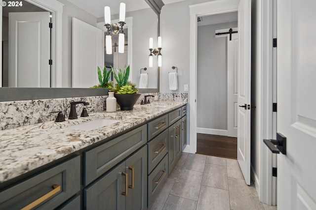 bathroom featuring wood-type flooring and vanity