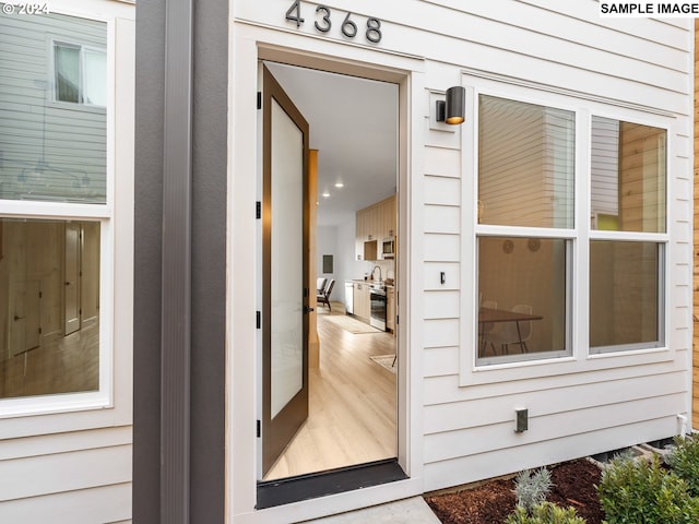 doorway to property featuring sink