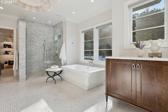 bathroom featuring independent shower and bath, crown molding, and vanity