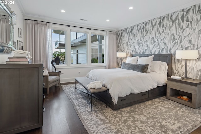 bedroom featuring crown molding and dark wood-type flooring