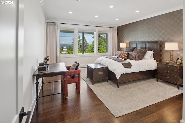 bedroom featuring ornamental molding and dark wood-type flooring